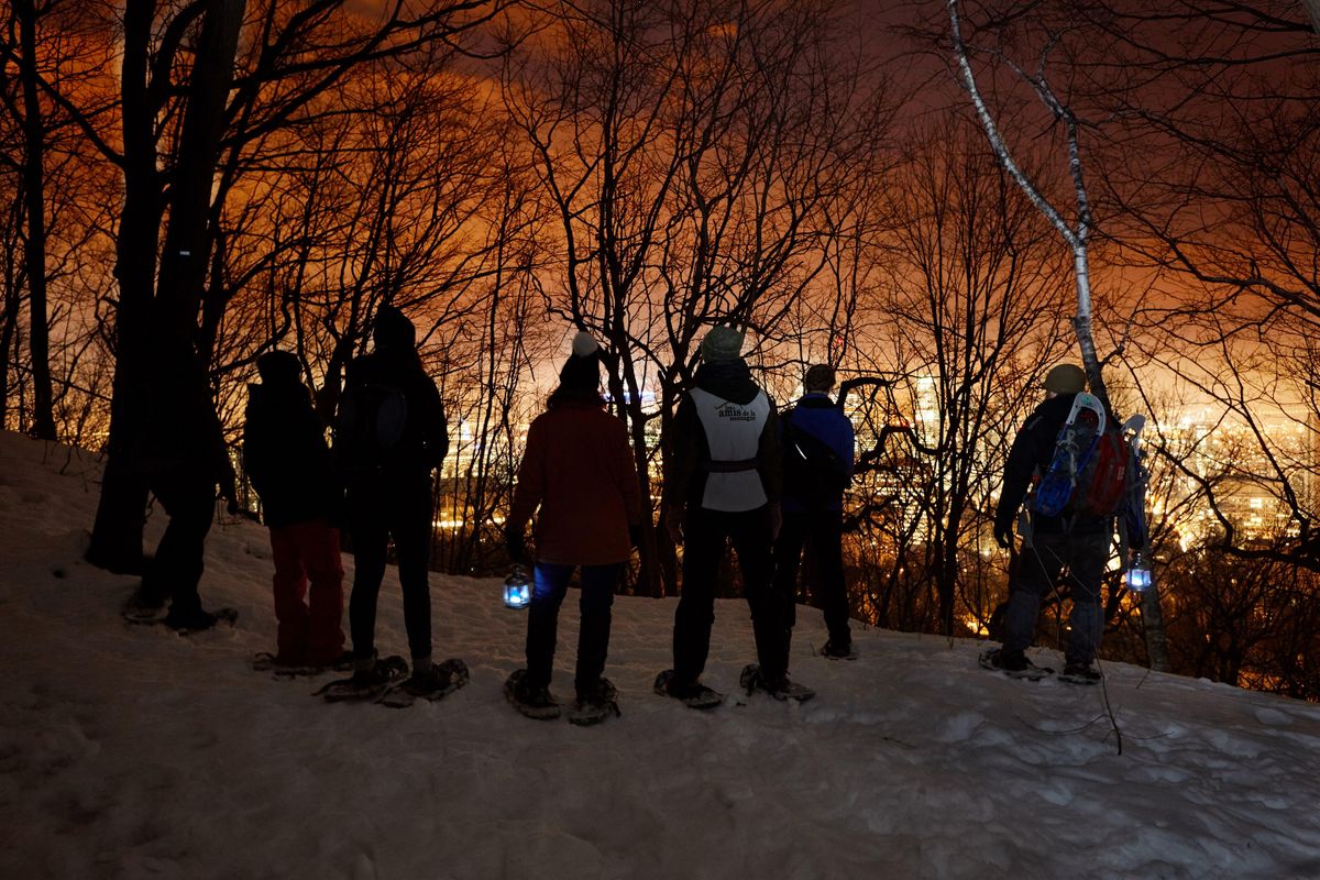 Snowshoe Tour By the Glow of the City Lights Pavillon du Lacaux